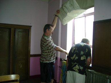 Harry Miller at the window he almost fell out of.jpg